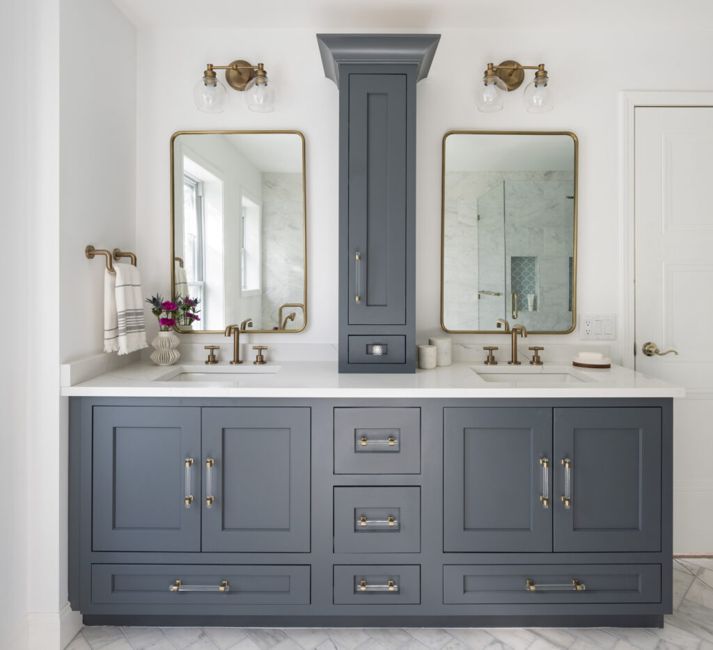 Needham luxury master bathroom with dark blue/gray double vanity and vanity tower design by by JP Hoffman Design Build
