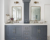 Needham luxury master bathroom with dark blue/gray double vanity and vanity tower design by by JP Hoffman Design Build